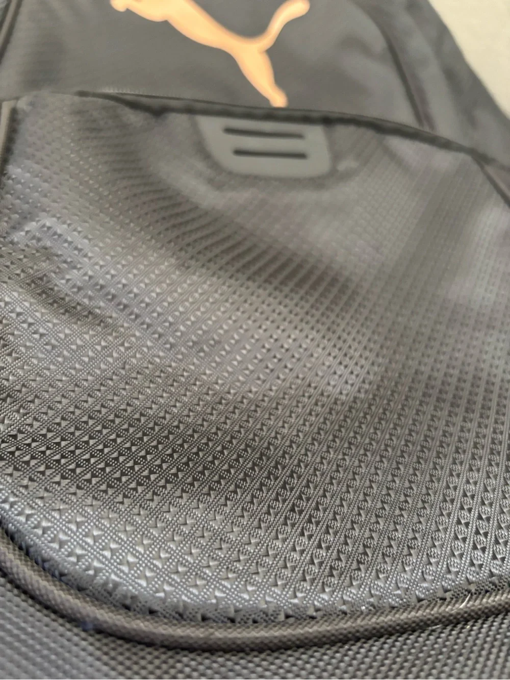 Puma Black Backpack with Copper Puma Logo